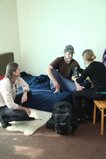 Figure 20.  The team makes a house call to a formerly homeless patient living in supportive housing.  Taken by Margaret Molloy.  