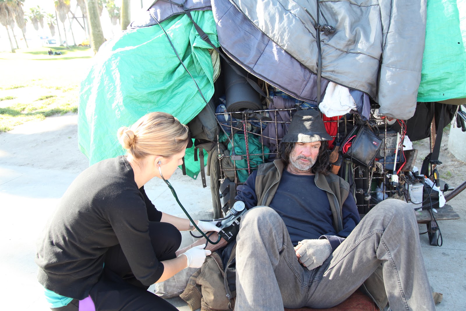 Checking vital signs in the field. Taken by Margaret Molloy.