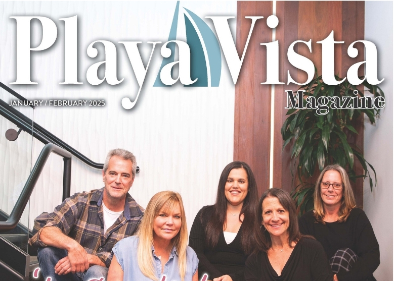 Five Adults, Four Women And One Man, Sit And Smile Together Indoors In Front Of A Staircase, Under The Playa Vista Magazine January/February 2025 Cover Title. Five Adults, Four Women And One Man, Sit And Smile Together Indoors In Front Of A Staircase, Under The Playa Vista Magazine January/February 2025 Cover Title.