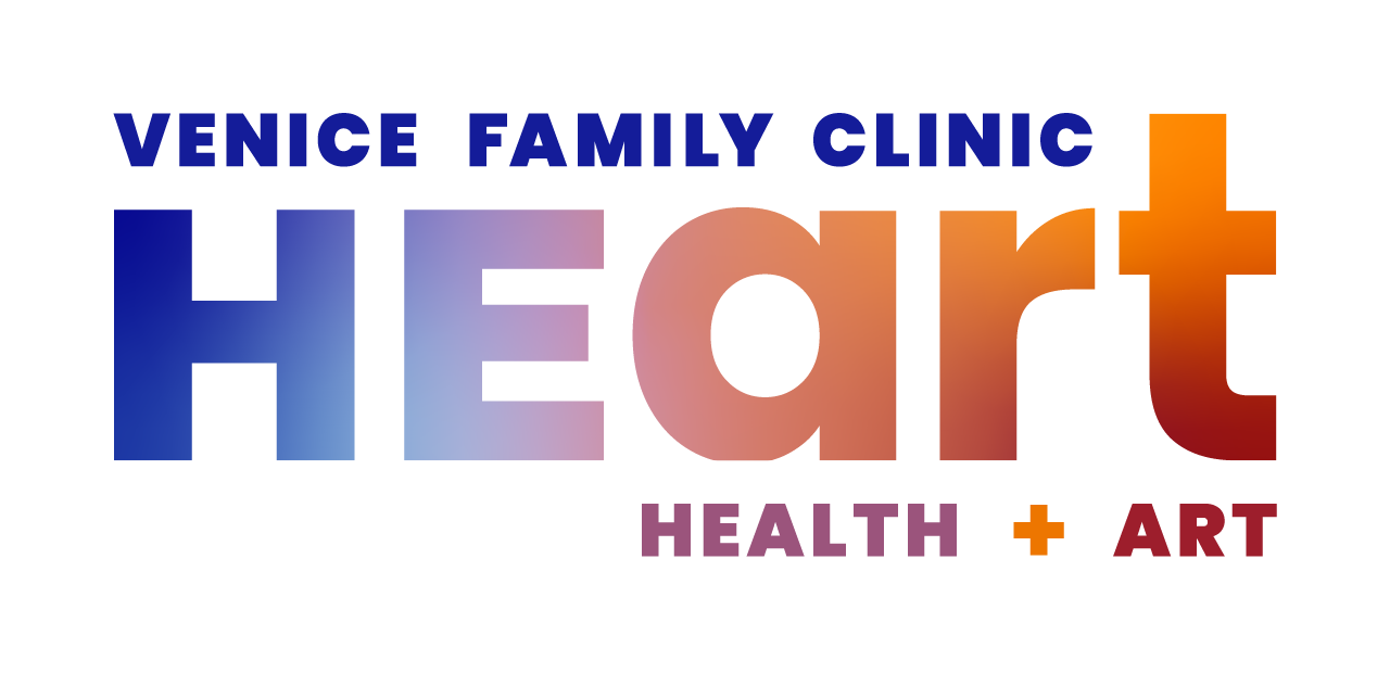 Venice Family Clinic Logo With HEart In Large Gradient Letters, Blending Blue And Orange. Health + Art Is Written Below In Smaller Text. Venice Family Clinic Logo With HEart In Large Gradient Letters, Blending Blue And Orange. Health + Art Is Written Below In Smaller Text.