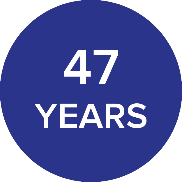 A Blue Circle With White Text In The Center That Reads 47 YEARS.