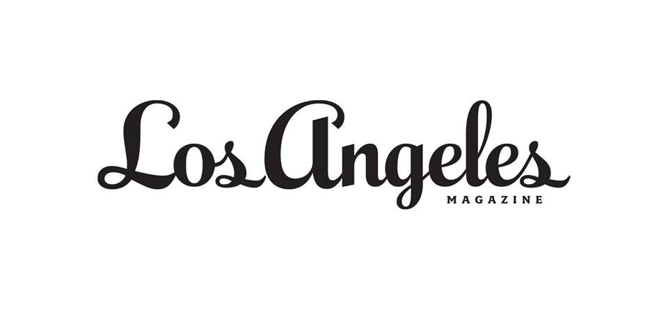 Black Cursive Text That Reads “Los Angeles” With “MAGAZINE” In Small Capital Letters Below And To The Right, All On A White Background. Black Cursive Text That Reads “Los Angeles” With “MAGAZINE” In Small Capital Letters Below And To The Right, All On A White Background.
